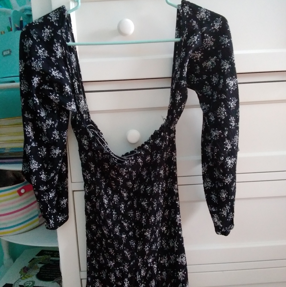 Black romper w/ white flowers/blue life/worn once